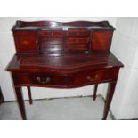 A 20th century mahogany desk.