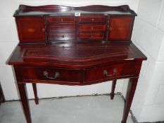 A 20th century mahogany desk.