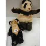 A 1920's English panda and a nightdress case, well worn.