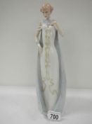 A Royal Doulton figure 'Reflections', HN3046, sugbed 1985,