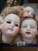 4 large Victorian dolls heads.