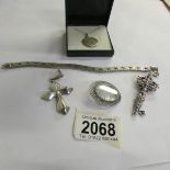 A collection of silver items: Italian bracelet, 2 crosses, brooch and St. Christopher.