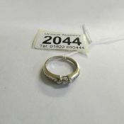 A 14ct gold ring set diamonds, size O.
