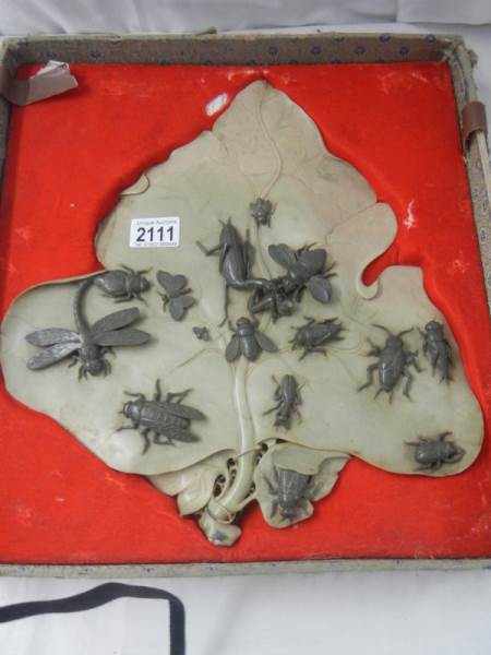 An early 20th century carved soapstone leaf with carved soapstone insects on top, 14.5" x 13".