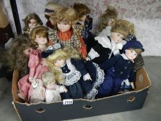 A good lot of 20th century porcelain headed dolls.