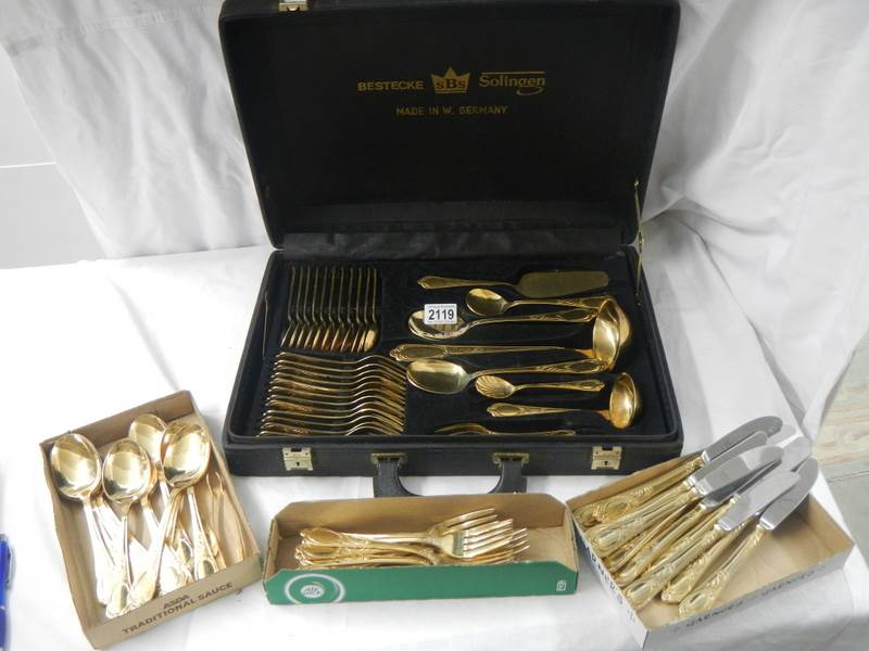 A gilded 12 place setting cutlery set by Besteoke Solingen, Germany. - Image 6 of 7