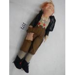 A vintage tramp cloth doll.