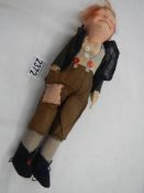 A vintage tramp cloth doll.