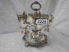 A Victorian Sheffield plate egg cup stand complete with spoons.