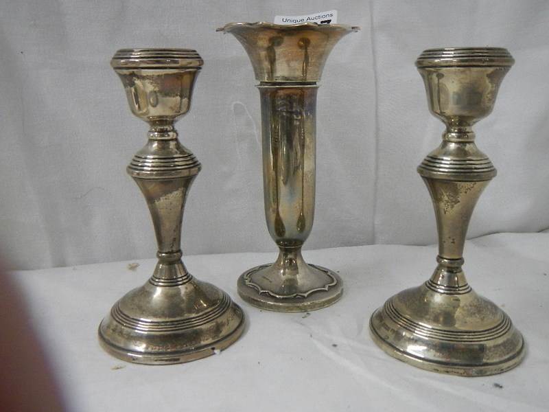 A pair of silver candlesticks and a silver spill vase. - Image 2 of 4