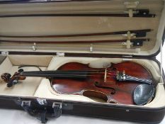 A cased late 19th century violin - Carlo Fissorie, Milano, Anno 1896? with 3 bows.