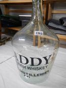 An old Paddy's Irish whisky jar, 18" tall.