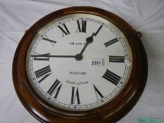 A double sided battery operated clock, marked Gent's, Leicester.