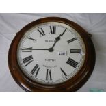 A double sided battery operated clock, marked Gent's, Leicester.