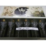 A boxed set of 6 Mystique Crystal D'arques quarter ounce wine glasses, made in France 1995.