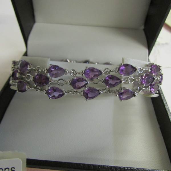 A pair of amethyst set ear pendants in yellow metal together with an amethyst set bracelet with - Image 2 of 3