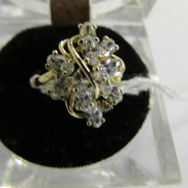 An oval cut white stone set cluster ring in 14ct gold hall marked, size P. - Image 2 of 2