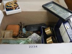 A shoe box containing glasses, jewellery etc.