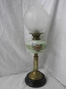 A Victorian oil lamp in good condition.