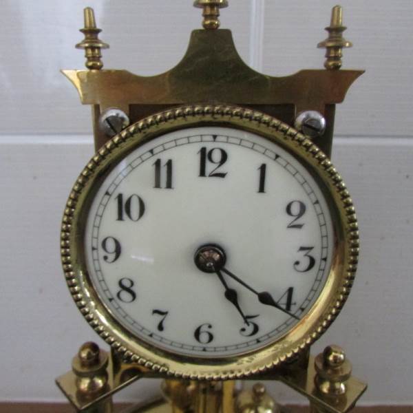 A good quality anniversary clock under glass dome. - Image 3 of 4