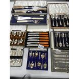 A mixed lot of cased silver plate cutlery, spoons etc.