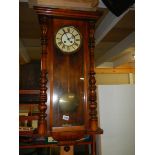 A Victorian mahogany Vienna wall clock.