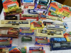 Approximately 25 boxed die cast models,