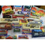 Approximately 25 boxed die cast models,