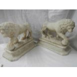 A matching pair of Victorian alabaster lions on bases.