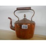 A Victorian copper kettle with acorn knob to lid and bronze handle.