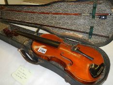 An old cased Nicholas Bertholini violin with bow, in need of repair.