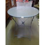 An old metal circular garden table.