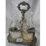 A Victorian 3 bottle tantalus in good condition.