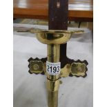 A brass and bakelite lantern clock wall bracket.