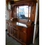 An early 20th century oak mirror back dresser in good order.
