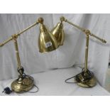 A pair of good quality mid 20th century adjustable table lamps.