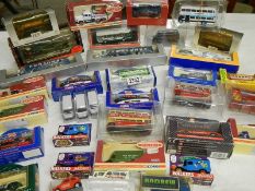 Approximately 30 boxed die cast models.