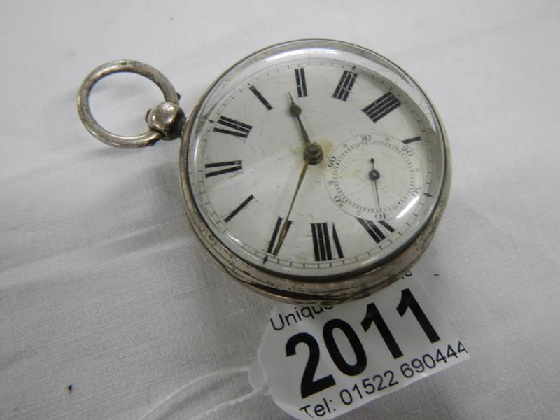 A silver verge pocket watch, George Fowler, Horncastle, in working order.