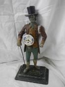 A Spelter figure clock seller clock.