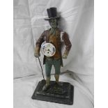 A Spelter figure clock seller clock.