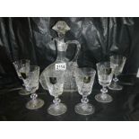 An unusual shaped Edinburgh crystal decanter and 6 Edinburgh crystal glasses.