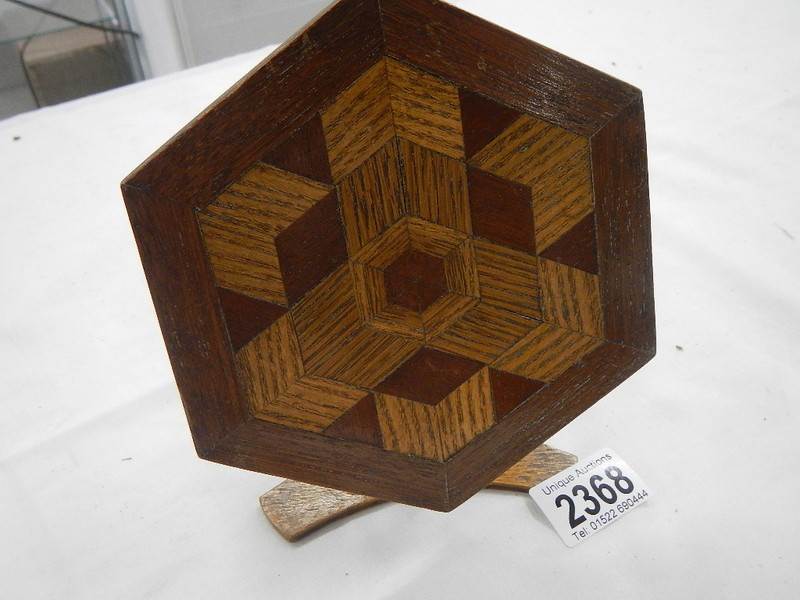 An inlaid traveller's sample tip top table.