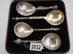 A cased set of 4 Norwegian silver anointing spoons, marked M Hammer 880, 1887.