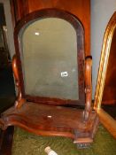 A Victorian mahogany toilet mirror.