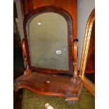 A Victorian mahogany toilet mirror.