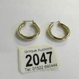 A pair of hoop earrings in 9ct gold, 5 grams.