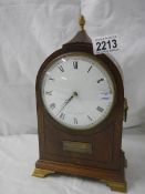 A Comitti of London mantel clock.