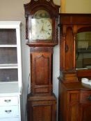 An oak 30 hour Grandfather clock.