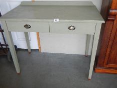 A painted 2 drawer side table.