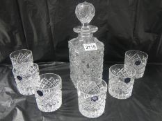 An old style hobnail cut glass decanter and a set of 6 Stuart crystal whisky tumblers.